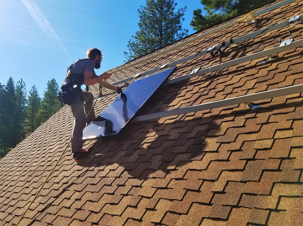 solar-panel-hanger-working-on-steep-roof.jpg